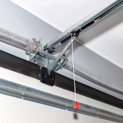 Torsion vs Tension Springs: Why Spring Repairs Are a Job for Professionals
