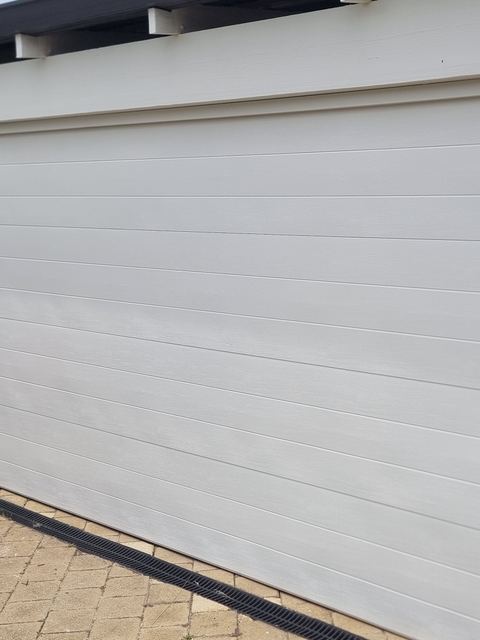Double sectional garage door in Surfmist COLORBOND with Mediterranean profile installed in Applecross, Perth